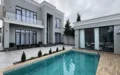 Shuvelanda 4 sotda 4 otaqli modern bag evi satilir