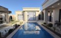 Shuvelanda 6.5 sotda yeni modern eshyali villa satilir